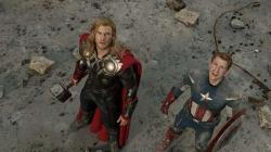 The Norse Thor stands beside the personification of America. Each more flamboyant than the other.